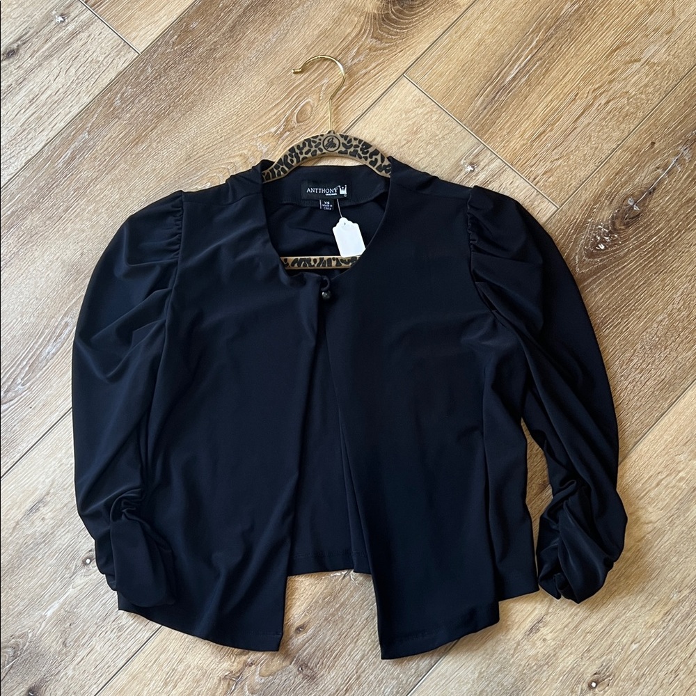 Black shrug